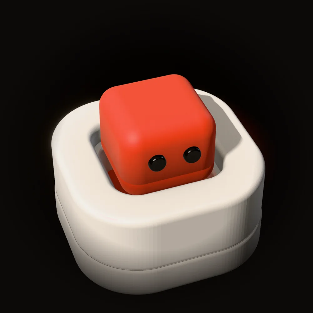 Bix, a vermilion rubber cube, in its own tray of one